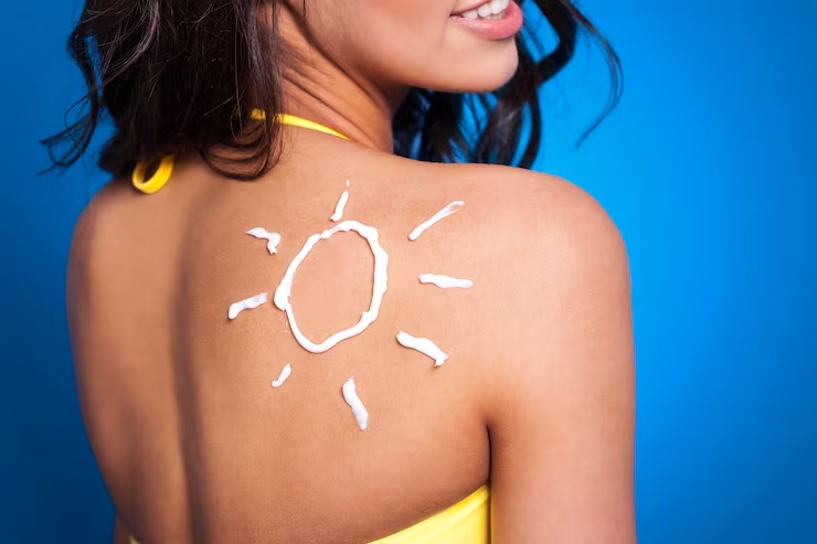 woman suncream applied on her body